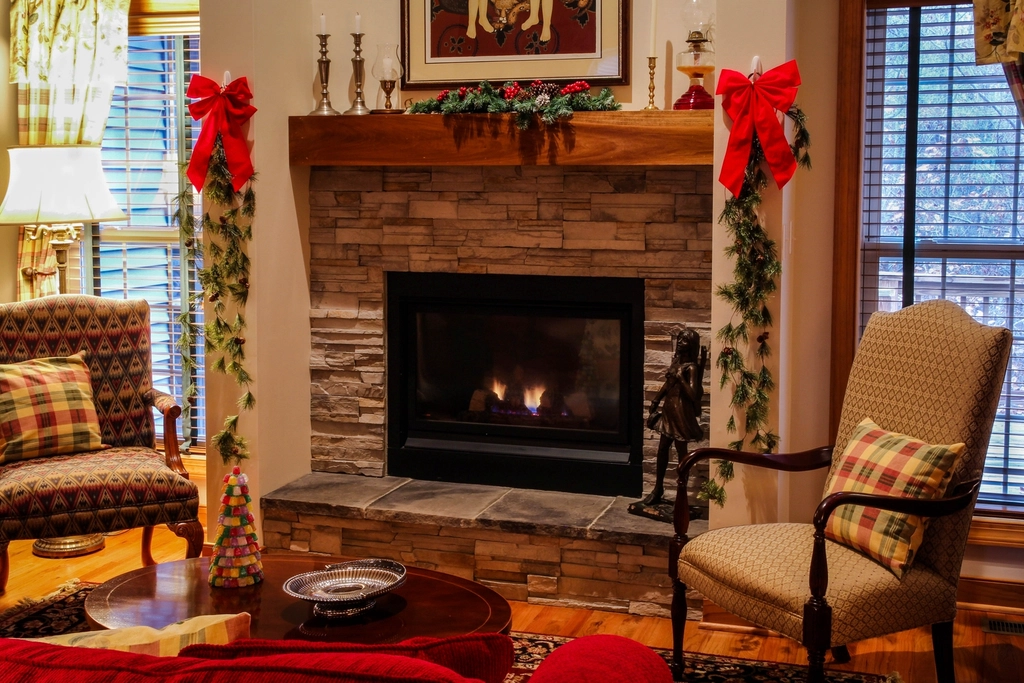 Wood fireplace mantels above a living room fireplace