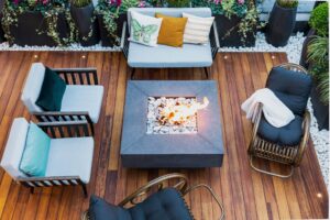 Outdoor fireplace with chimney on a stone patio